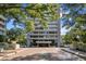 Plaza Towers building exterior with landscaping and parking at 2575 Peachtree Ne Rd # 9G, Atlanta, GA 30305