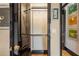 Walk-in closet with built-in shelves and rods at 2575 Peachtree Ne Rd # 9G, Atlanta, GA 30305