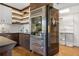 Modern kitchen with SubZero refrigerator and pantry at 2575 Peachtree Ne Rd # 9G, Atlanta, GA 30305
