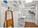Organized storage room with shelving and pegboard at 2575 Peachtree Ne Rd # 9G, Atlanta, GA 30305