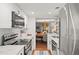 Modern kitchen with white shaker cabinets, marble countertops, and stainless steel appliances at 16 Ivy Ne Rdg, Atlanta, GA 30342