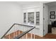 Upper-level landing with window seat and view at 16 Ivy Ne Rdg, Atlanta, GA 30342