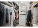 Large walk-in closet with ample shelving and rods at 16 Ivy Ne Rdg, Atlanta, GA 30342