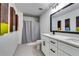 Clean bathroom with double vanity and patterned floor at 2508 Connally Dr, East Point, GA 30344