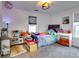 Charming bedroom with colorful bedding and plenty of space for toys and a desk at 2508 Connally Dr, East Point, GA 30344