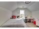 Bright bedroom with a queen-size bed, built-in desk, and ample closet space at 2508 Connally Dr, East Point, GA 30344