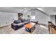 Comfortable bonus room with sofa, coffee table and TV at 2508 Connally Dr, East Point, GA 30344