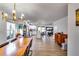 Open concept dining room with view into kitchen and living room at 2508 Connally Dr, East Point, GA 30344