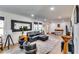 Open living space with hardwood floors, sectional sofa, and modern decor at 2508 Connally Dr, East Point, GA 30344