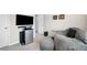 Casual recreation room with a mini-fridge, large beanbag chair, and mounted TV, great for unwinding at 319 Pinewood Dr, Woodstock, GA 30189