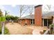 Brick home with fenced backyard and patio at 790 Oakhaven Dr, Roswell, GA 30075