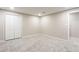 Finished basement with double doors and closet at 790 Oakhaven Dr, Roswell, GA 30075