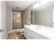Clean basement bathroom with shower and updated vanity at 790 Oakhaven Dr, Roswell, GA 30075
