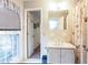 Clean bathroom, featuring a vanity with a white sink at 790 Oakhaven Dr, Roswell, GA 30075