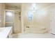 Bathroom features a corner soaking tub, shower, and updated vanity at 790 Oakhaven Dr, Roswell, GA 30075