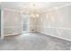 Elegant dining room with a chandelier and hardwood floors at 790 Oakhaven Dr, Roswell, GA 30075