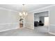 Formal dining room showcasing hardwood floors and a view to the living room at 790 Oakhaven Dr, Roswell, GA 30075