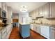 Well-equipped kitchen with granite countertops and an island at 790 Oakhaven Dr, Roswell, GA 30075