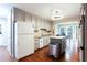Updated kitchen featuring granite countertops and stainless steel appliances at 790 Oakhaven Dr, Roswell, GA 30075