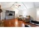 Living room boasts hardwood floors, a fireplace, and built-in entertainment center at 790 Oakhaven Dr, Roswell, GA 30075