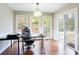 Home office with built-in desk and sliding glass door to backyard at 790 Oakhaven Dr, Roswell, GA 30075