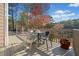 Covered back porch with outdoor seating, overlooking the lake view at 19 Spring Lake Trl, White, GA 30184