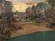 Spacious backyard with an in-ground pool, gazebo, and lake access at 19 Spring Lake Trl, White, GA 30184