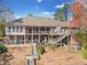 Expansive backyard with multi-level decks and staircase at 19 Spring Lake Trl, White, GA 30184