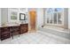 Elegant bathroom featuring a soaking tub, tiled floors, dual sink vanity, and glass shower at 19 Spring Lake Trl, White, GA 30184