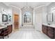 Beautiful bathroom with dual vanities, shower, soaking tub, and natural light at 19 Spring Lake Trl, White, GA 30184
