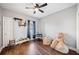 Bedroom with ceiling fan, hardwood floors, and a comfortable, inviting layout at 19 Spring Lake Trl, White, GA 30184