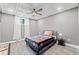Finished basement bedroom with drop ceiling, recessed lighting, hardwood floors, and natural light at 19 Spring Lake Trl, White, GA 30184