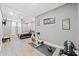 Finished basement bedroom with drop ceiling, recessed lighting, and an adjacent exercise area at 19 Spring Lake Trl, White, GA 30184