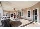 Large covered porch with ceiling fan and space to enjoy the outdoors at 19 Spring Lake Ne Trl, White, GA 30184
