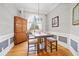 Cozy dining room with stylish table and chairs, plus natural light at 19 Spring Lake Trl, White, GA 30184