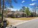 Charming single-Gathering home with well-maintained lawn and driveway at 19 Spring Lake Trl, White, GA 30184