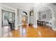 Welcoming foyer with hardwood floors and views to office and dining room at 19 Spring Lake Trl, White, GA 30184