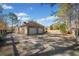 Two-car garage with spacious driveway at 19 Spring Lake Trl, White, GA 30184