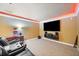 Home theater with large screen, cozy seating, and ambient lighting for entertainment at 19 Spring Lake Trl, White, GA 30184