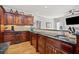 Granite counters, stainless steel appliances, and wooden cabinets make a chef's delight at 19 Spring Lake Trl, White, GA 30184