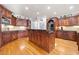 Kitchen with extensive cabinetry, large island, and stainless steel appliances at 19 Spring Lake Trl, White, GA 30184