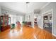 Elegant living room featuring hardwood floors, large windows, and classic decor at 19 Spring Lake Trl, White, GA 30184