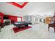 Spacious living room with fireplace, pool table, and tiled floor at 19 Spring Lake Trl, White, GA 30184