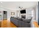 Spacious living room with hardwood floors, a fireplace, and plenty of natural light at 19 Spring Lake Trl, White, GA 30184