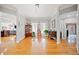 Open-concept living room featuring hardwood floors and neutral tones at 19 Spring Lake Trl, White, GA 30184