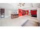 Expansive living room features a wet bar and island seating, ideal for hosting guests at 19 Spring Lake Trl, White, GA 30184