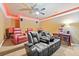 Home theater with recliner seating, projector screen, and cozy lighting at 19 Spring Lake Trl, White, GA 30184