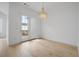 Bright dining area with wood floors and backyard access at 1980 Flying Scotsman Dr # 10, Kennesaw, GA 30144