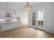 Bright, open kitchen with a large island, modern appliances, and hardwood flooring at 1980 Flying Scotsman Dr # 10, Kennesaw, GA 30144