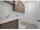 Neat laundry room with modern basin and tile floors at 1980 Flying Scotsman Dr # 10, Kennesaw, GA 30144